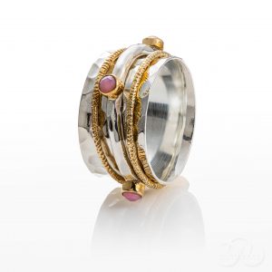 Jewelry photography of a sterling silver and gold ring